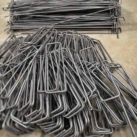 Lotes de peças dobradas separadas por medida